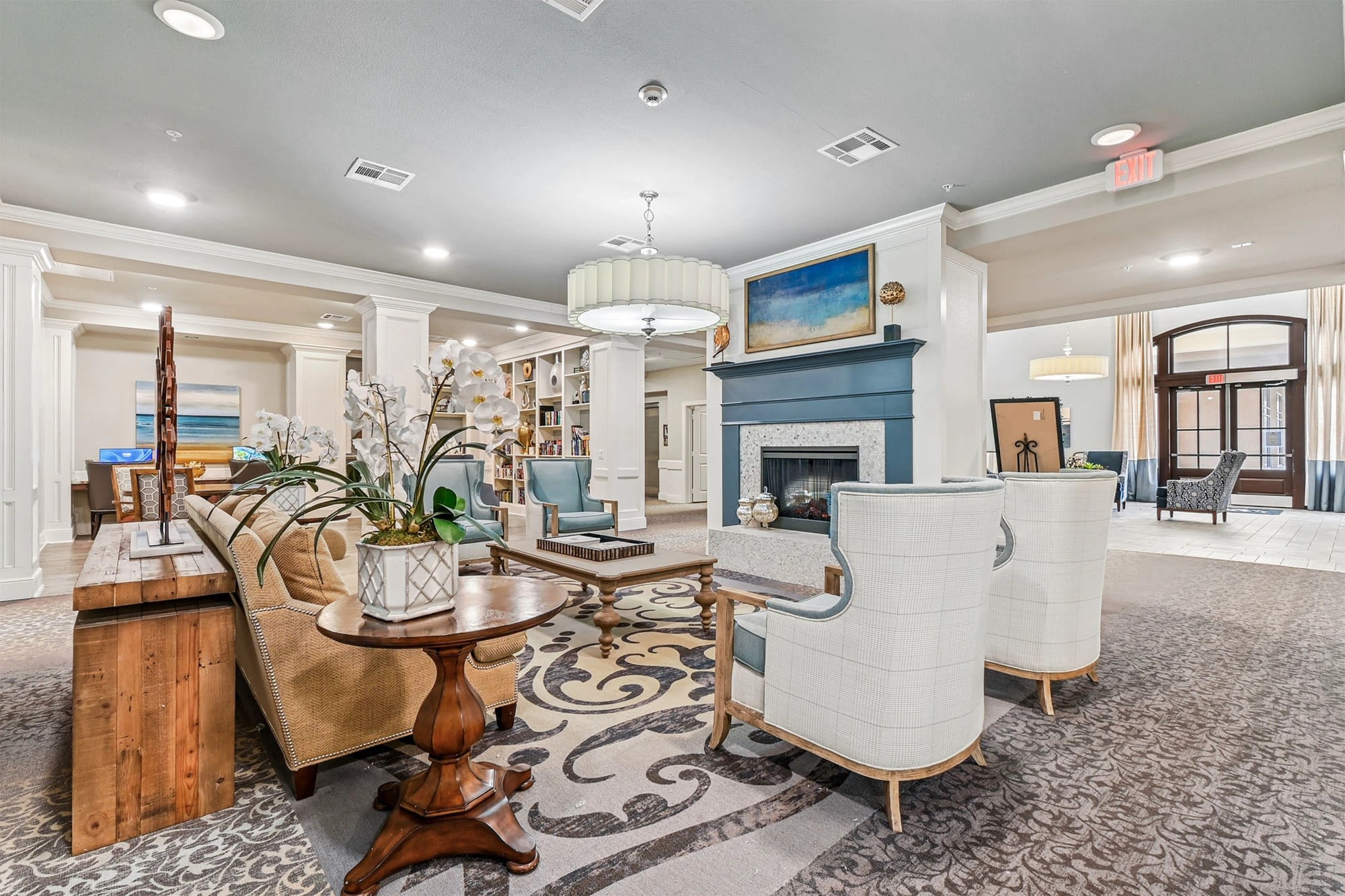 Elegant hotel lobby with fireplace and seating area