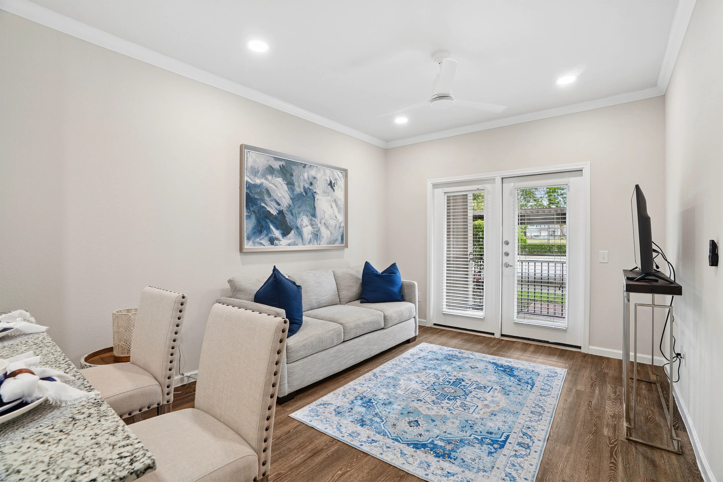 Modern living room with blue decor and artwork
